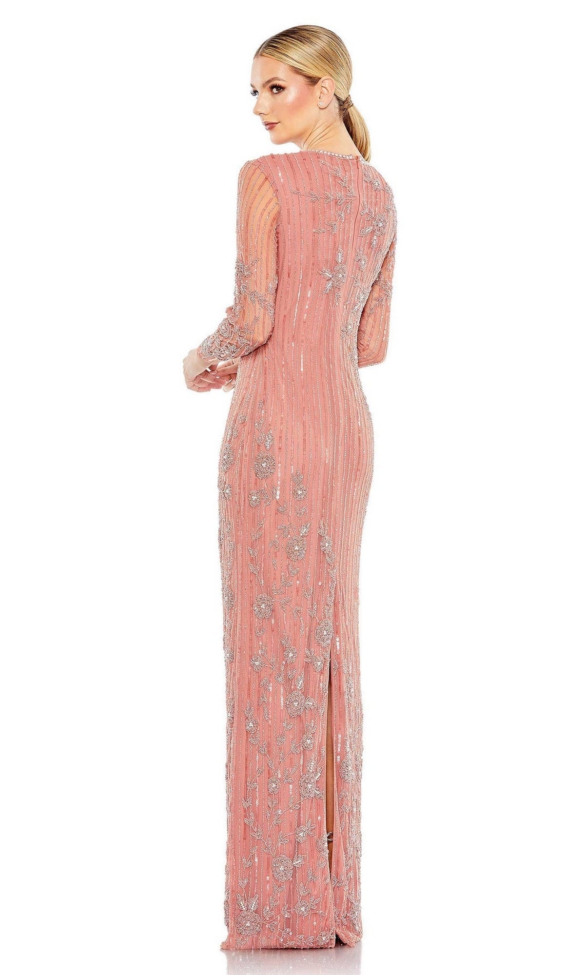Woman shown from the back wearing the Long Sleeve Sequin Formal Gown: Mac Duggal 93626, a floor-length blush pink evening dress with silver embellishments.